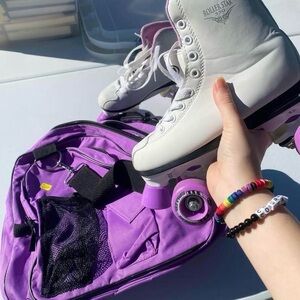White Roller Skates with Purple Wheels